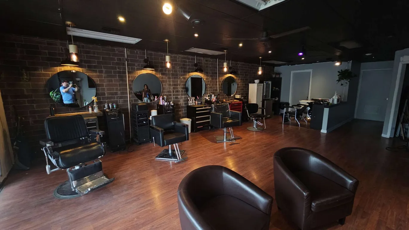 Stylist station with tools laid out on the counter